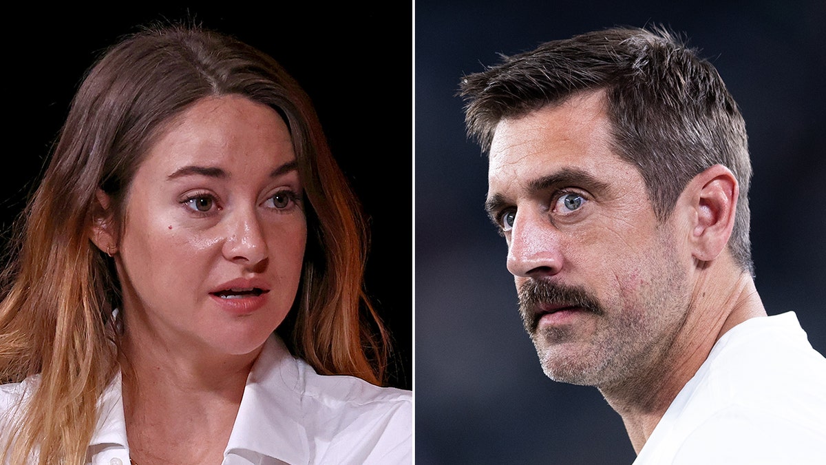 Shailene Woodley con una blusa blanca parece seria durante una conversación Aaron Rodgers parece serio caminando por el campo con un bigote pronunciado