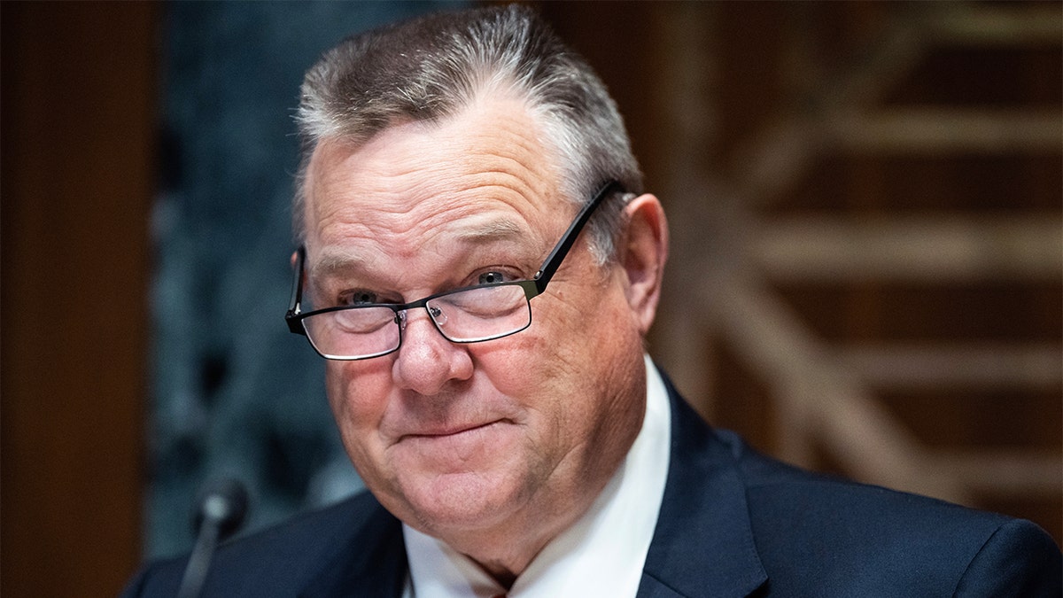 Sen. Jon Tester, D-Mont., arrives for the Senate Appropriations Subcommittee on Defense hearing on the 