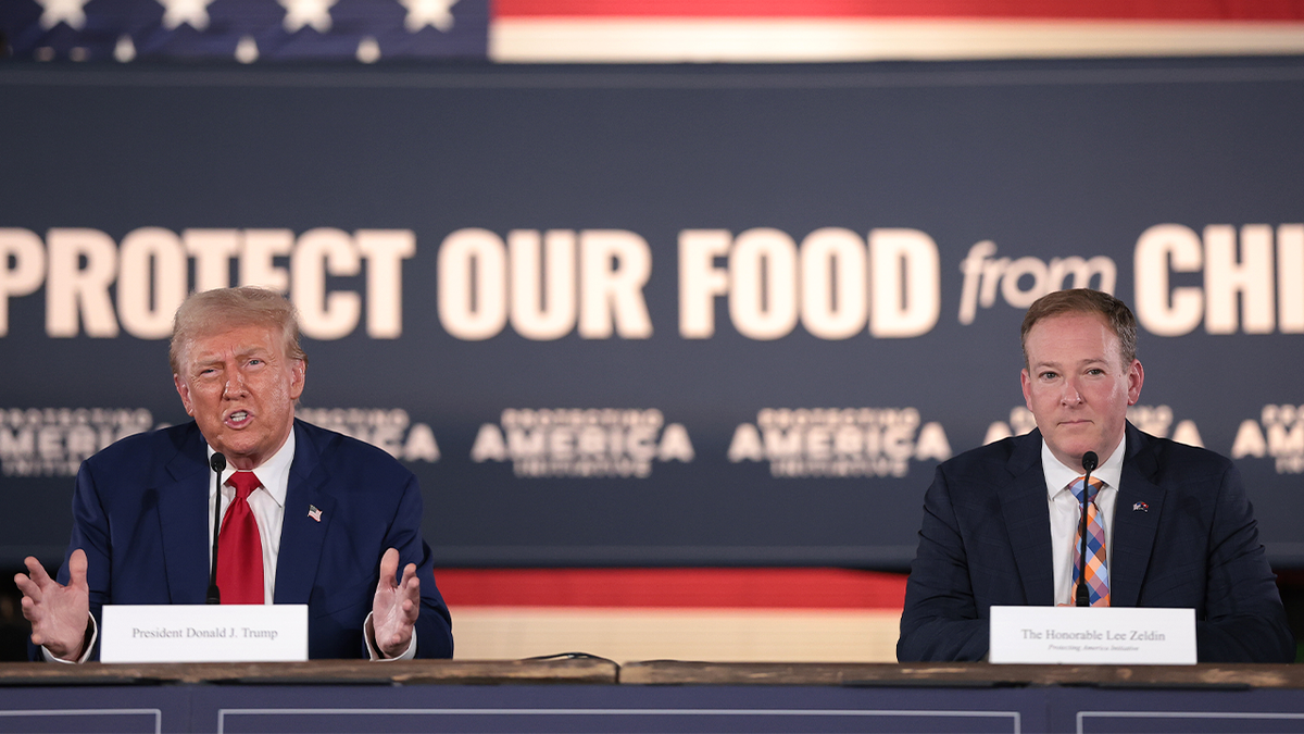 Trump speaks at the table