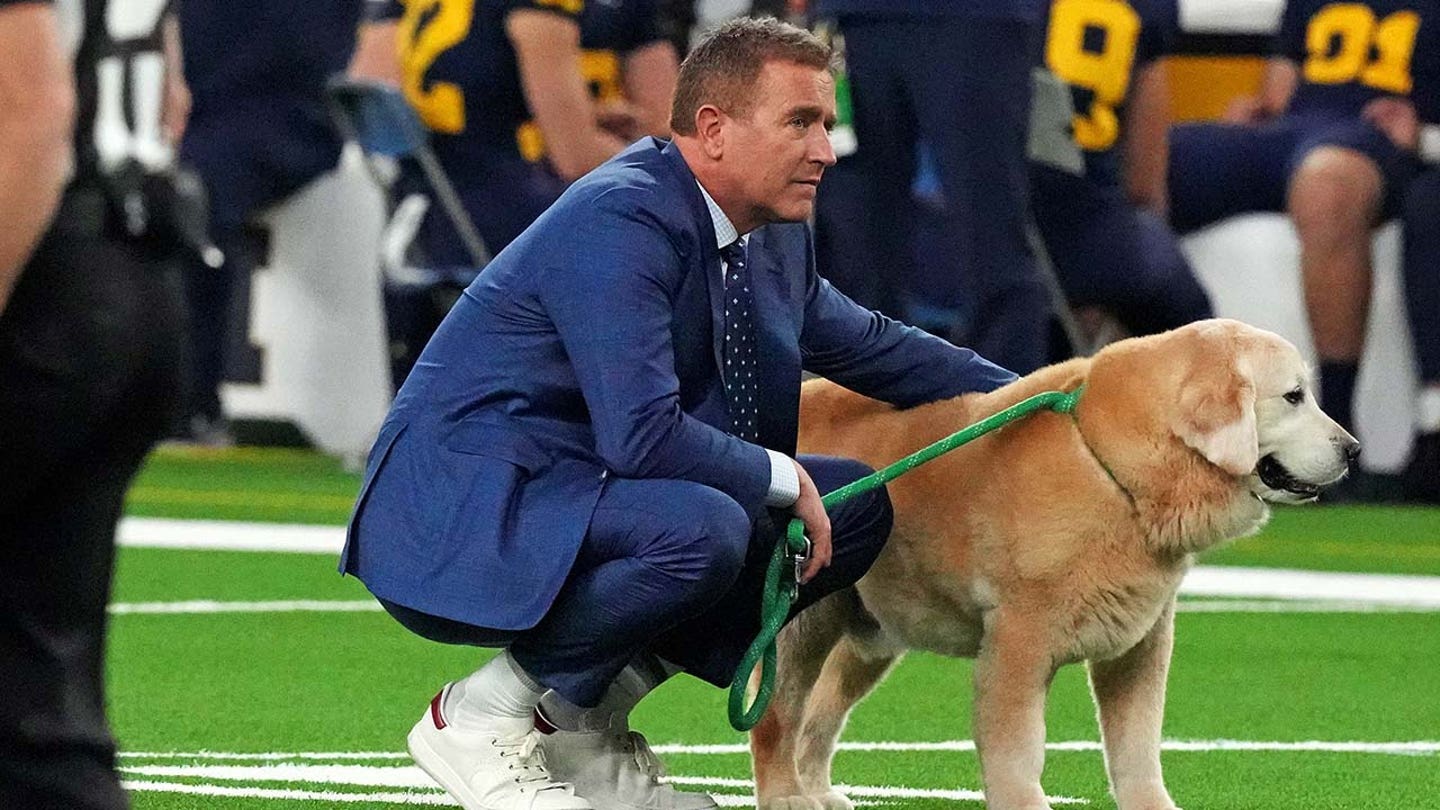 ESPN Analyst Kirk Herbstreit's Dog Ben Defends His Place in the Booth