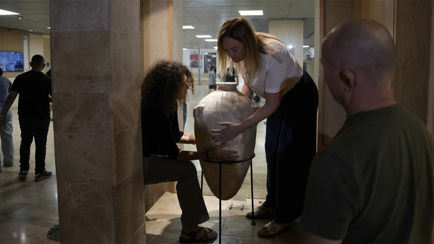 Ancient Jar Shattered by Curious Tot Returns to Museum Display