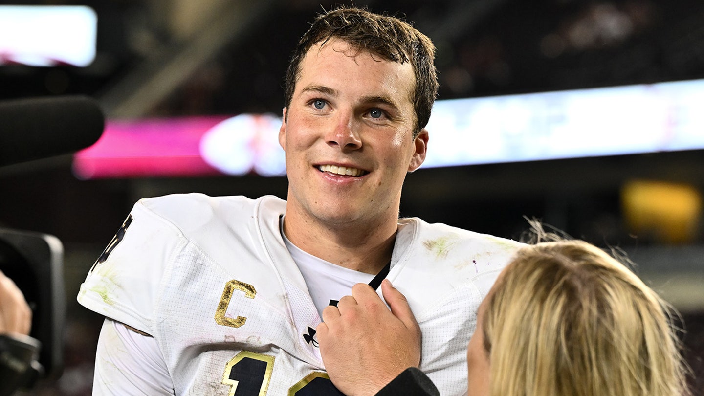 Notre Dame Quarterback's Faith on Display: Cross on Face and Bible on Wrist