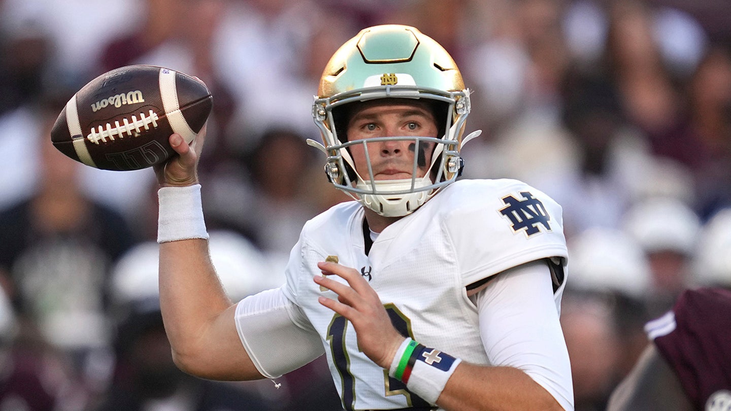 Notre Dame Quarterback's Faith on Display: Cross on Face and Bible on Wrist