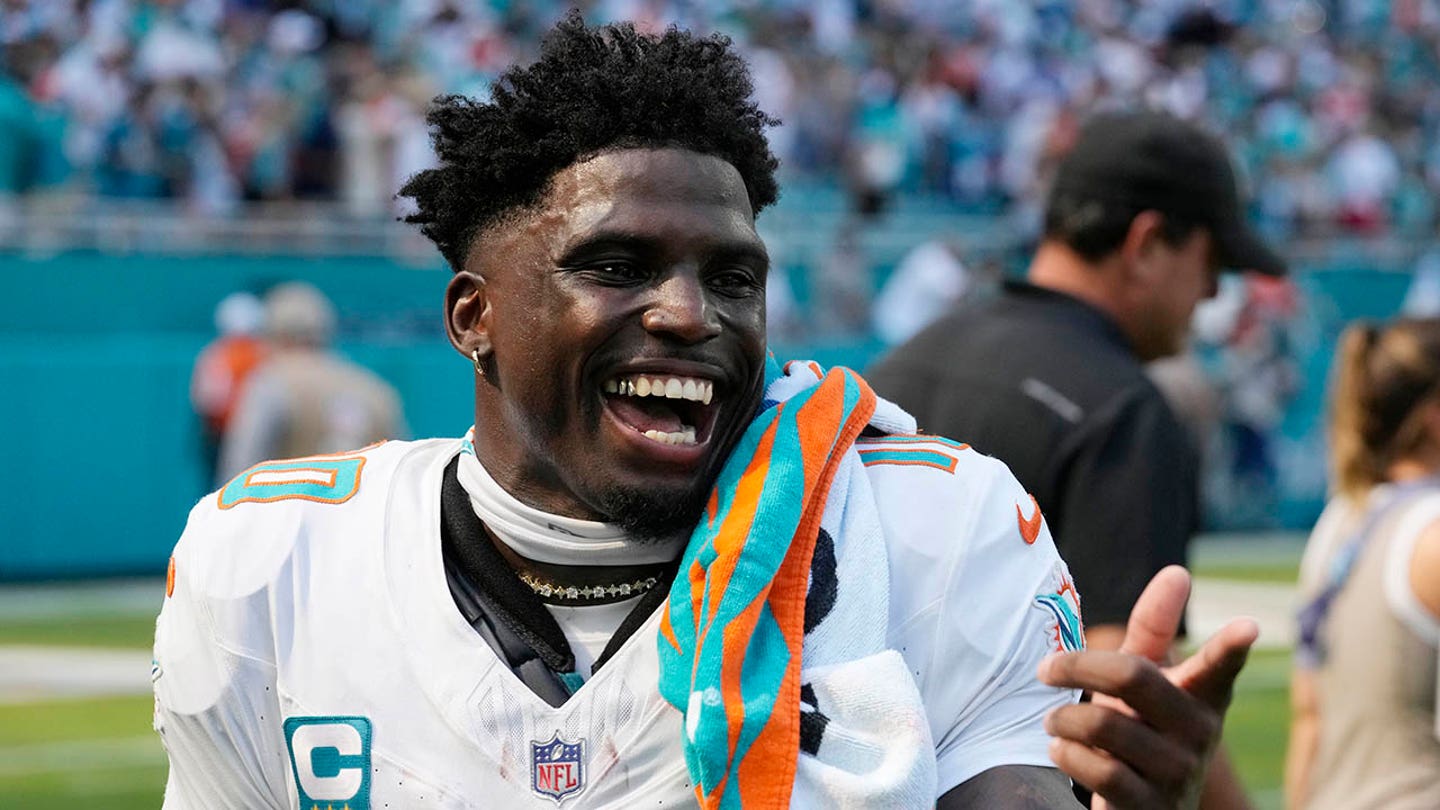 Tyreek Hill Explodes After Police Detention, Leads Dolphins to First Win with Dominant Performance