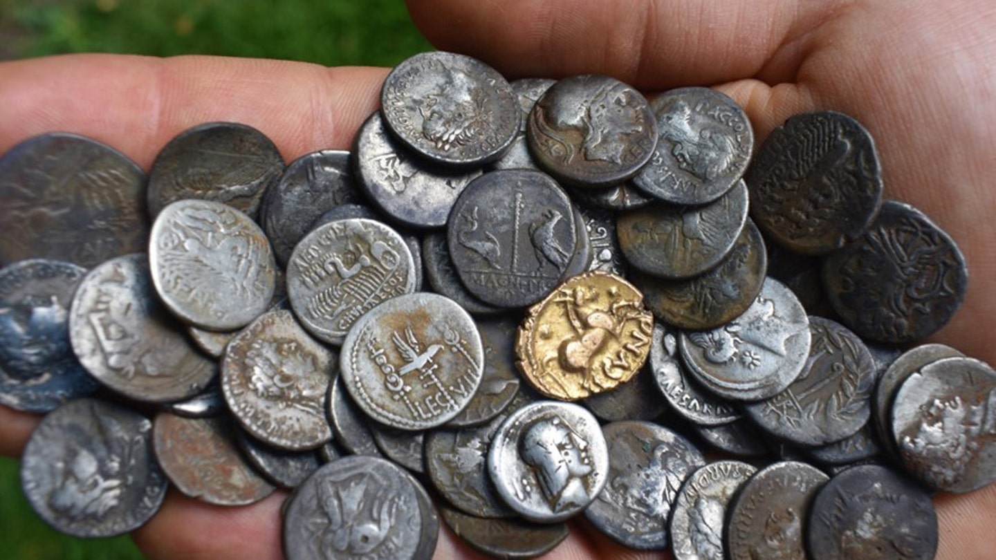 Ancient Treasure Unearthed: Archaeologists Discover 1,000-Year-Old Ring and Roman Coin Hoard