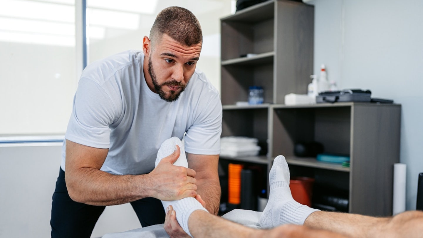 physical therapist male patient