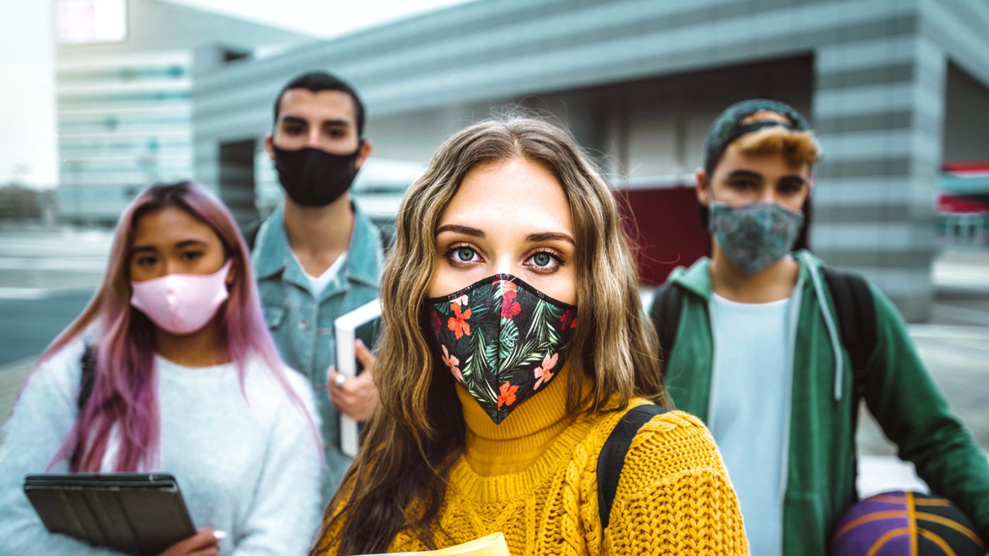 teens in masks