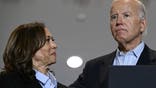 US President Joe Biden (R) embraces US Vice President and Democratic presidential candidate Kamala Harris as he speaks during a campaign rally at the International Brotherhood of Electrical Workers (IBEW) Local 5 in Pittsburgh, Pennsylvania, on September 2, 2024. (Photo by Brendan SMIALOWSKI / AFP) (Photo by BRENDAN SMIALOWSKI/AFP via Getty Images)
