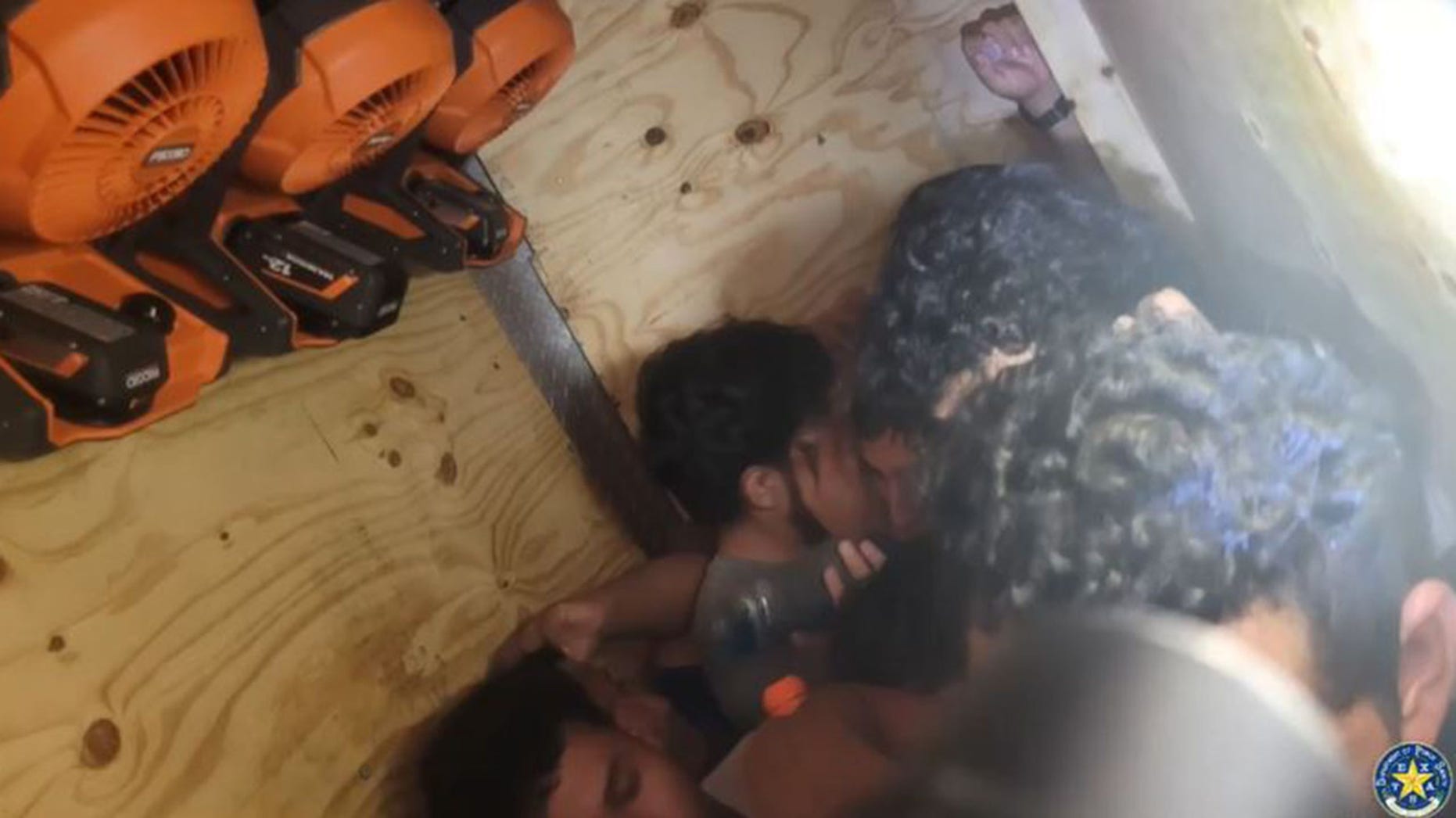 Smuggling Attempt Foiled: 16 Illegal Immigrants Found Concealed Behind False Wall in Texas Trailer