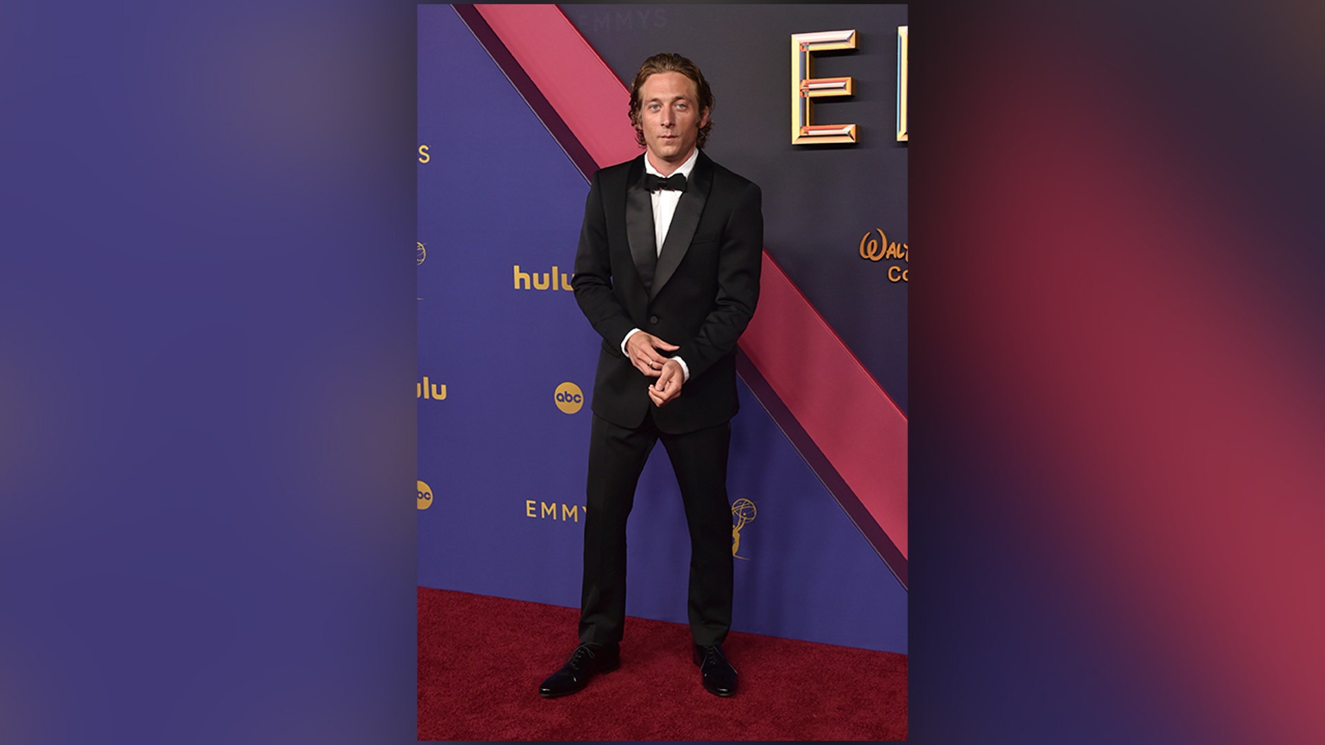 Jeremy Allen White, nominated for his work on "The Bear," wore a black suit on the 2024 Emmy Awards red carpet.