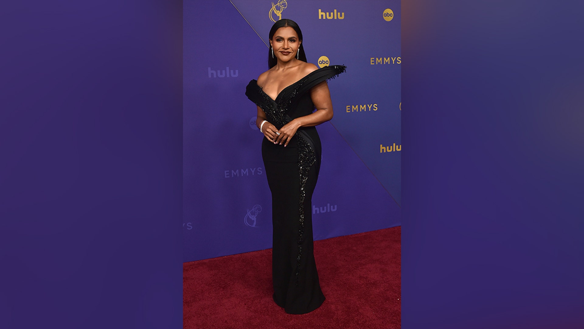 Mindy Kailing in a black gown at the 2024 Emmy Awards.