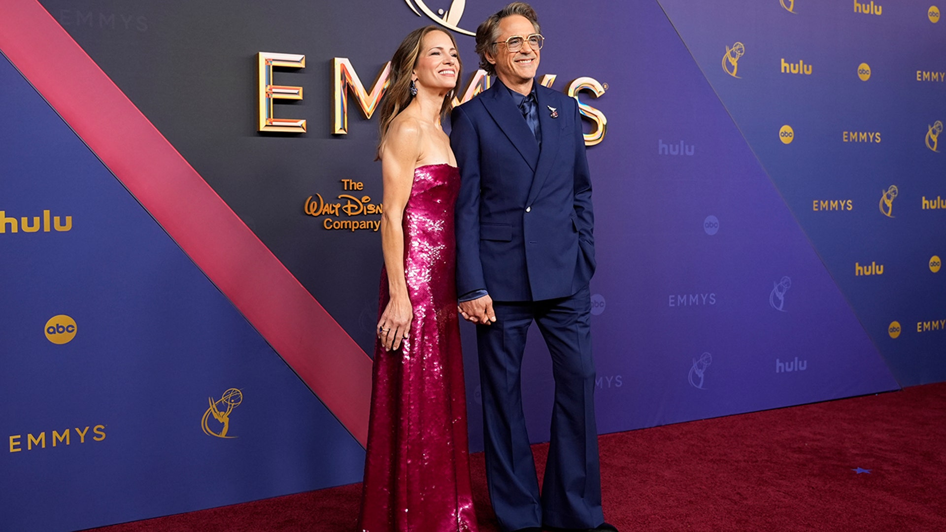 Robert Downey Jr. and his wife, Susan Downey, on the 2024 Emmy Awards red carpet.
