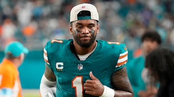 Social media takes aim at NFL quarterback’s wife after she shares pro-Trump post - Fox News