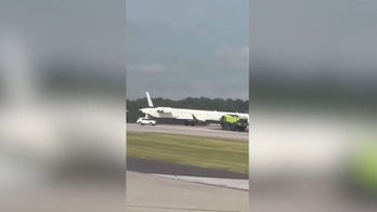 Video shows Delta plane's tail severed after collision while taxiing at Atlanta airport