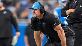 Lions coach Dan Campbell wrestles giant bean bag on daughter's college move-out day