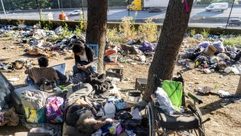 Mujer desaparecida hallada muerta en una maleta en un campamento de indigentes de Seattle