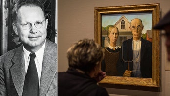 ‘American Gothic’, famous piece by artist Grant Wood, is displayed to visitors at the Art Institute of Chicago