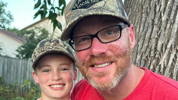 Young boy uses rifle to save his father from black bear attack: 'A hero'