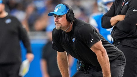 Lions coach Dan Campbell wrestles giant bean bag on daughter's college move out day