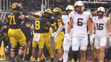 Minnesota Governor and Beto O'Rourke Witness Golden Gophers' Narrow Loss to Michigan