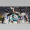 Titans pick up 1st win of season in ugly romp against Dolphins