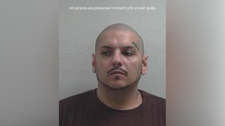 A mugshot of Angelo Garza