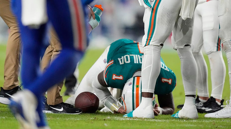 Dolphins’ Tua Tagovailoa suffers concussion after big collision with Bills’ Damar Hamlin