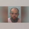 A mugshot of Tyler Collins