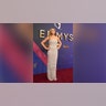 Jennifer Aniston, nominated for her role in "The Morning Show," in a beaded gown at the 2024 Emmy Awards red carpet.