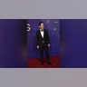 Paul Rudd, nominated for his role in "Only Murders in the Building," looked dapper in a black suit on the 2024 Emmy Awards Red Carpet.