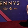 Selena Gomez in a black gown with a halter neckline at the 2024 Emmy Awards.