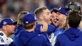 Los Angeles Dodgers' Freddie Freeman, center, left, celebrates at home plate after hitting a game-winning grand slam against the New York Yankees during the 10th inning in Game 1 of the baseball World Series, Friday, Oct. 25, 2024, in Los Angeles. - Fox News