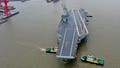 SHANGHAI, CHINA - MAY 01: The CNS Fujian, Chinas third aircraft carrier, begins its maiden sea trial on May 1, 2024 in Shanghai, China. The CNS Fujian, one of the most important pieces of military hardware China is working on, was officially unveiled in June 2022 in Shanghai as it was towed out of its dry dock at the China State Shipbuilding Corps Jiangnan Shipyard. (Photo by Pu Haiyang/VCG via Getty Images) - Fox News