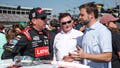 CONCORD, NORTH CAROLINA - OCTOBER 13: Republican vice presidential nominee, U.S. Sen. J.D. Vance (R-OH) (R) speaks to Kyle Busch, driver of the #8 Lenovo Chevrolet, and RCR team owner and NASCAR Hall of Famer, Richard Childress (C) on the grid prior to the NASCAR Cup Series Bank of America ROVAL 400 at Charlotte Motor Speedway on October 13, 2024 in Concord, North Carolina. (Photo by Jared C. Tilton/Getty Images) - Fox News