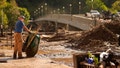 FILE - Brian McCormack pauses after using a wheelbarrow to clean up debris left in the aftermath of Hurricane Helene, Oct. 1, 2024, in Marshall, N.C. (AP Photo/Jeff Roberson) - Fox News