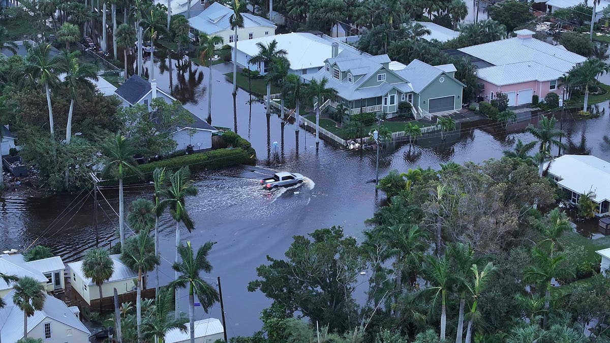 In this aerial view, Flood waters inundate a neighborhood after Hurricane Milton came ashore