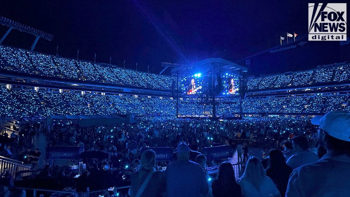 The stadium lit up   during Eric Church's show  astatine  the Concert for Carolina