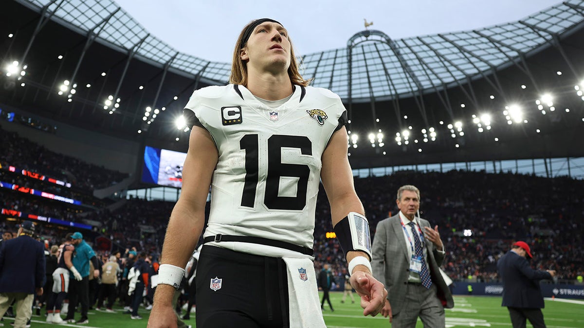 Trevor Lawrence walks off field