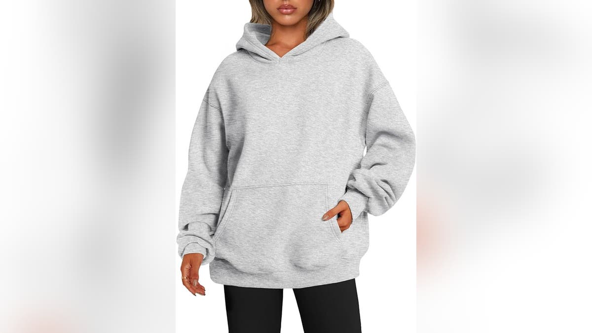 Stay comfy with an oversized sweatshirt. 