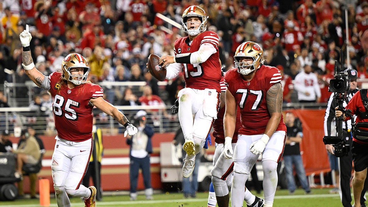 Brock Purdy celebrates