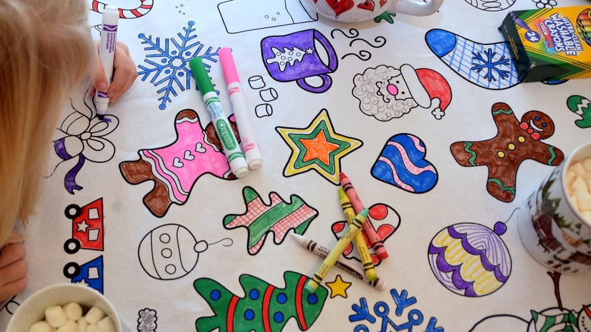 Give the kids something to do at the table with a coloring tablecloth. 