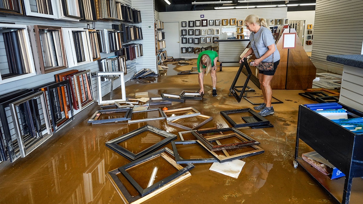 business owners cleanable  up   flooding from hurricane helene