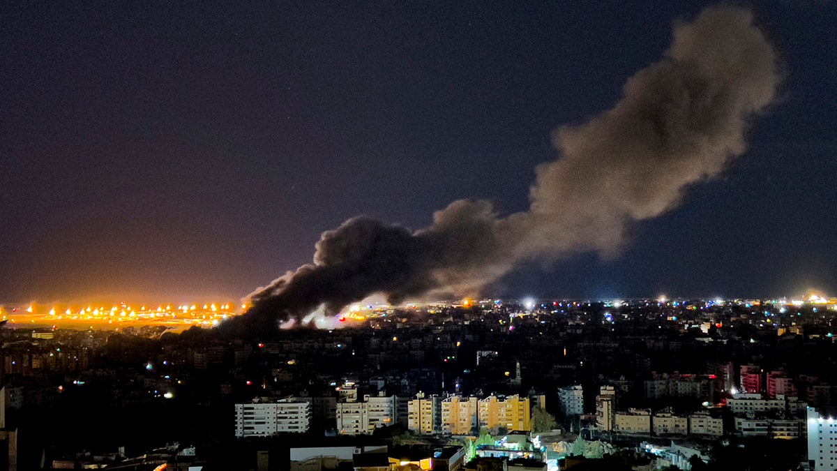 Smoke rises from an Israeli airstrike that deed  the confederate  suburb of Beirut