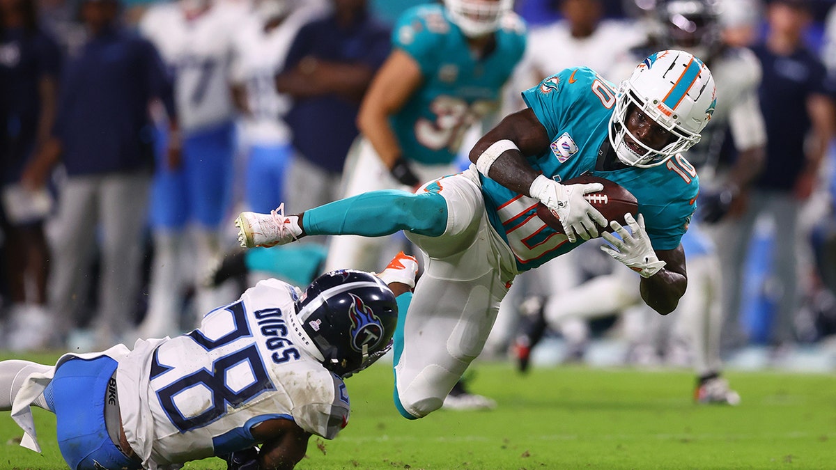 Tyreek Hill is tackled