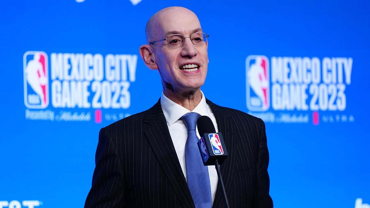 Adam Silver speaks at podium