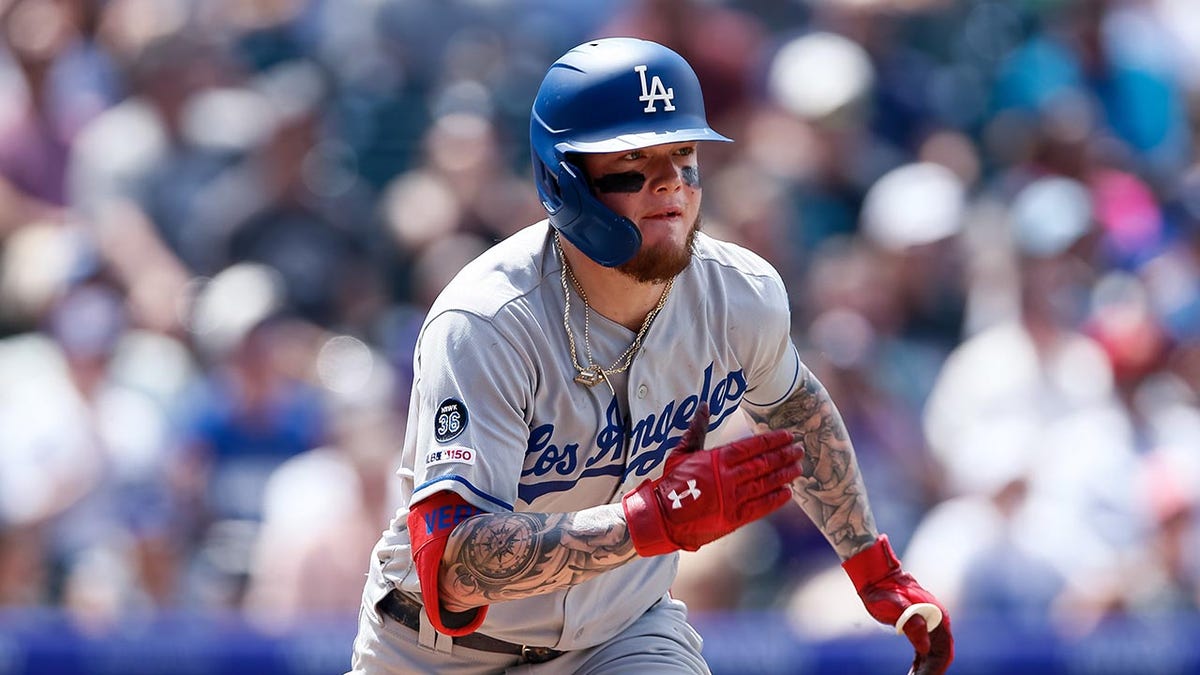 Alex Verdugo runs during an MLB game