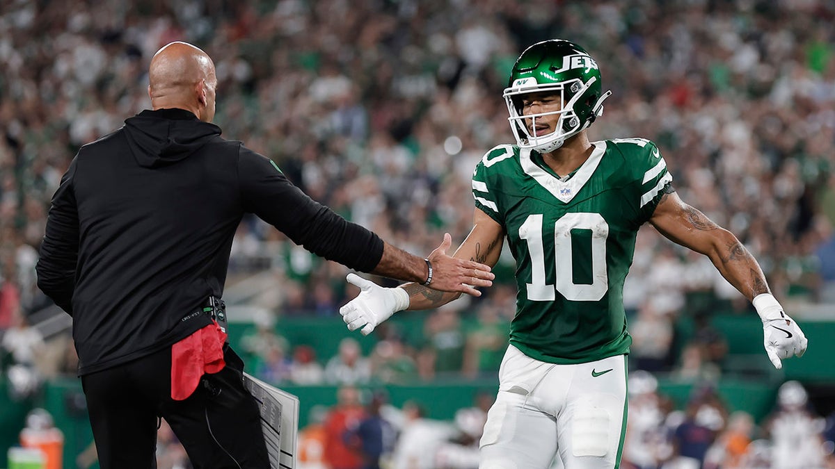 Allen Lazard y Robert Saleh