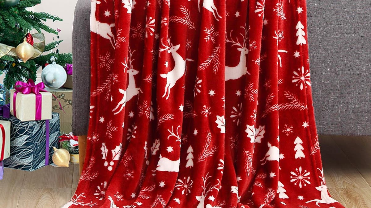 A cheerful Christmas throw is an easy way to warm a room.