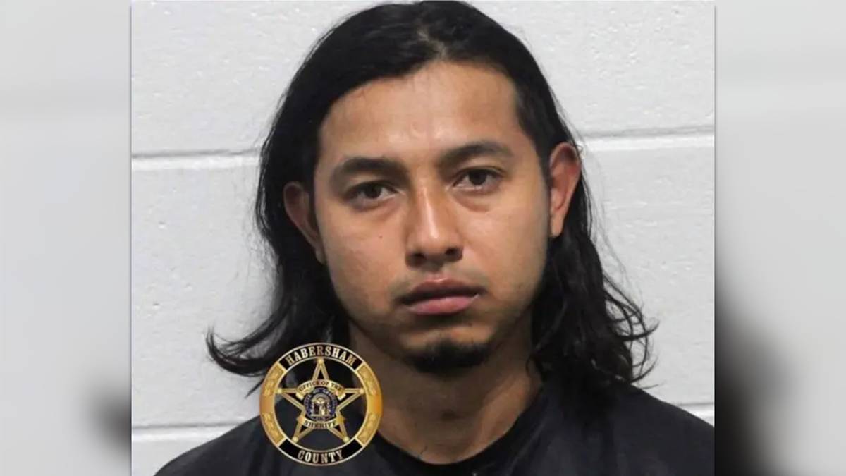 angel dejesus rivera-sanches mugshot has shoulder-length achromatic hairsbreadth successful a mugshot