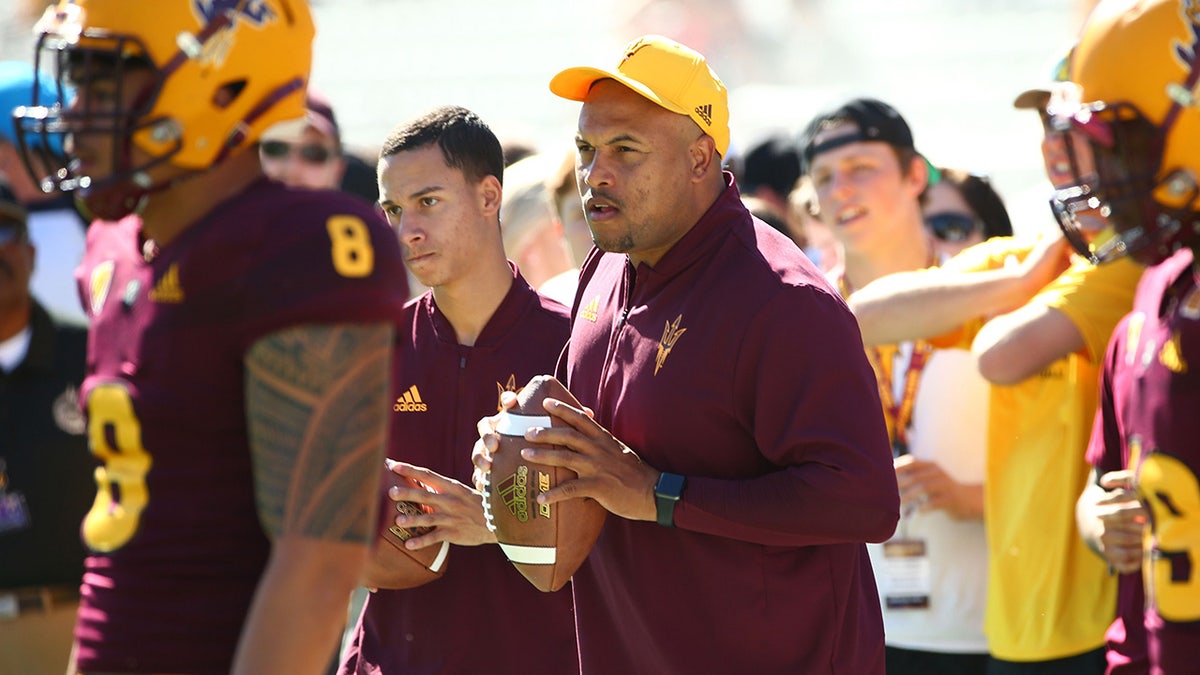 Antonio Pierce on field with Arizona State